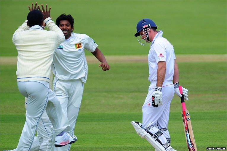 A dejected Andrew Strauss trudges away from the crease