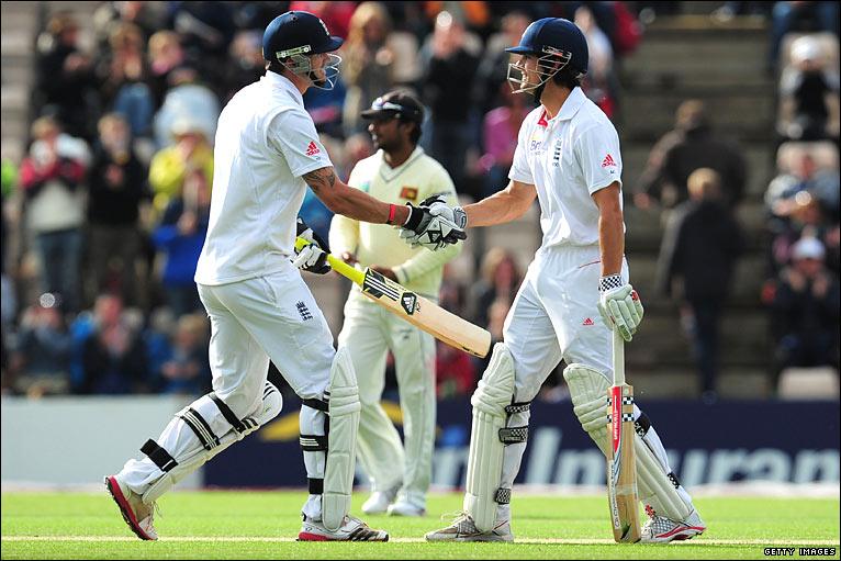 Kevin Pietersen (left) shakes hands with Alastair Cook