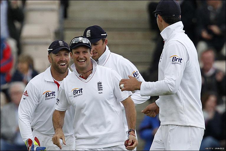 England captain Andrew Strauss is congratulated by his team-mates