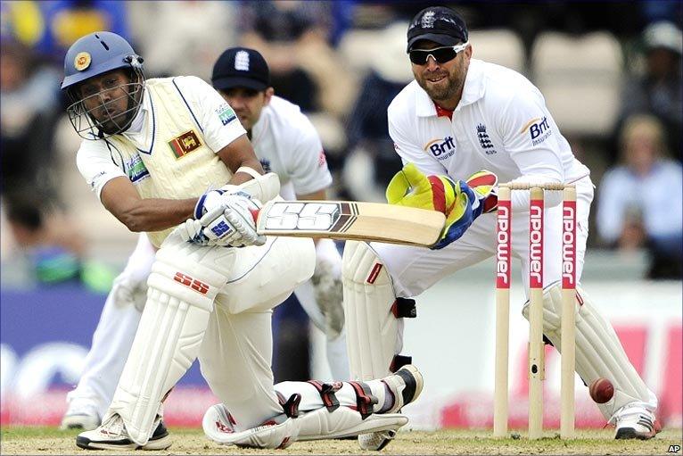 Thilan Samaraweera sweeps off the bowling of Graeme Swann