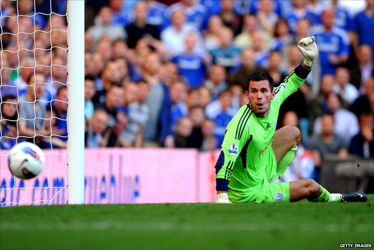 Ben Foster watches the ball go in his goal