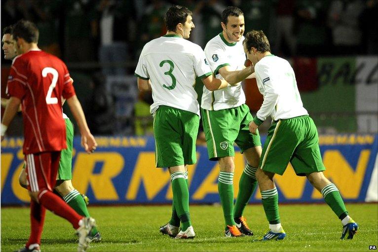 Republic of Ireland players celebrate.