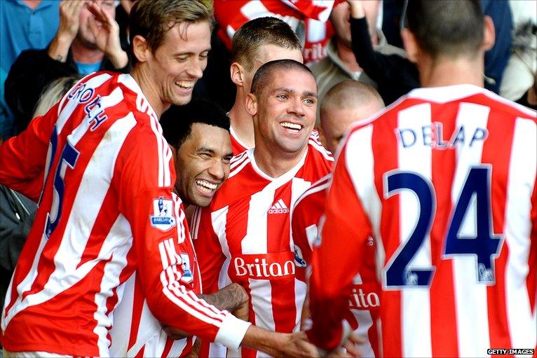 Jon Walters celebrates with Stoke teammates