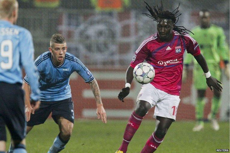 Bafetimbi Gomis (right) of Lyon scores the fastest Champions League hat-trick