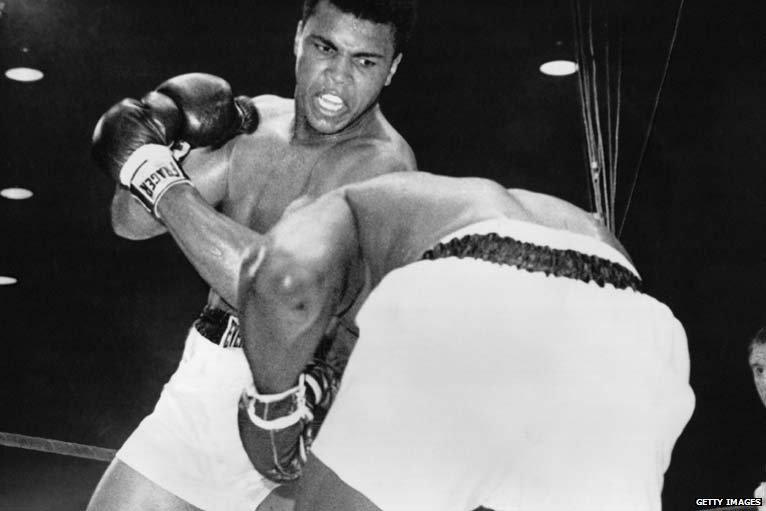 Muhammad Ali, then known as Cassius Clay, and Sonny Liston