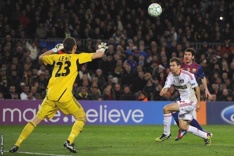 Messi scores his team's third goal (and his hat-trick strike) against Bayer Leverkusen