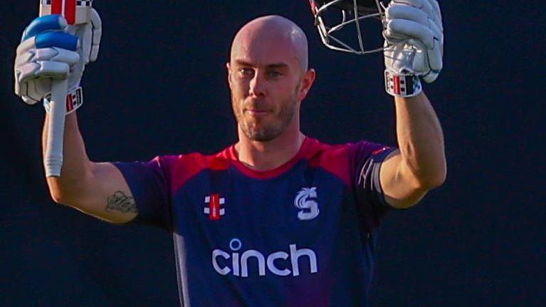 Chris Lynn celebrates scoring century