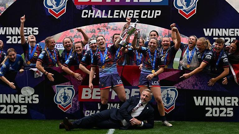 Wigan Warriors celebrate after winning the Women's Challenge Cup 2025