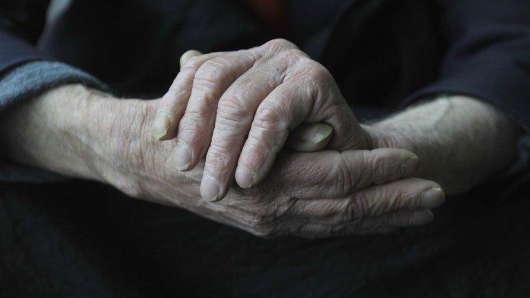 elderly person's hands