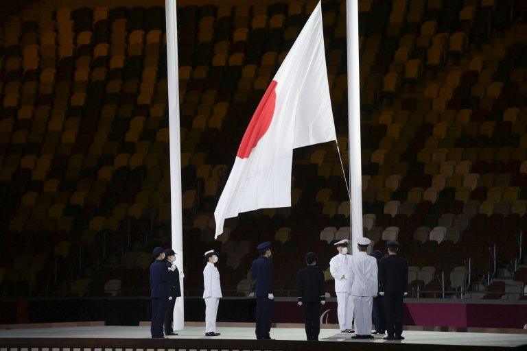 Japanese flag being raised