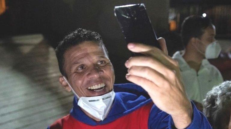 Opposition lawmaker Gilber Caro speaks to the media after being released, at the headquarters of the Special Actions Forces of the Bolivarian National Police, in Caracas, Venezuela, 31 August 2020