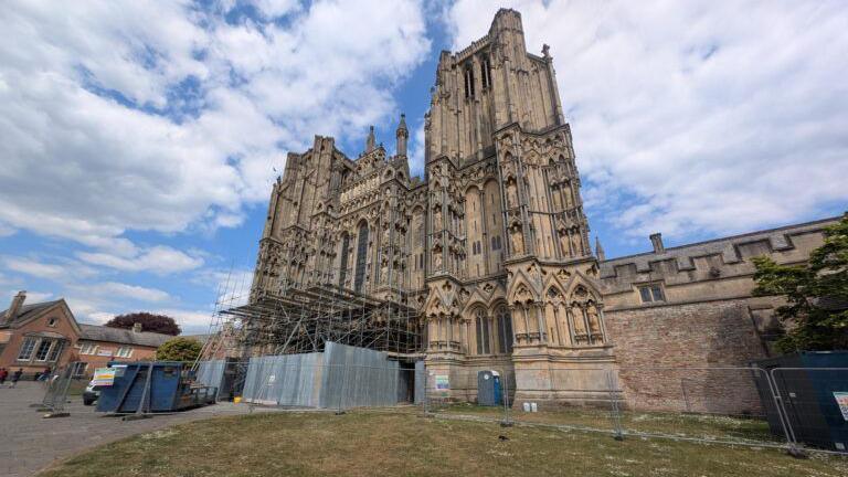 Wells Cathedral with scaffolding around it seen from the front
