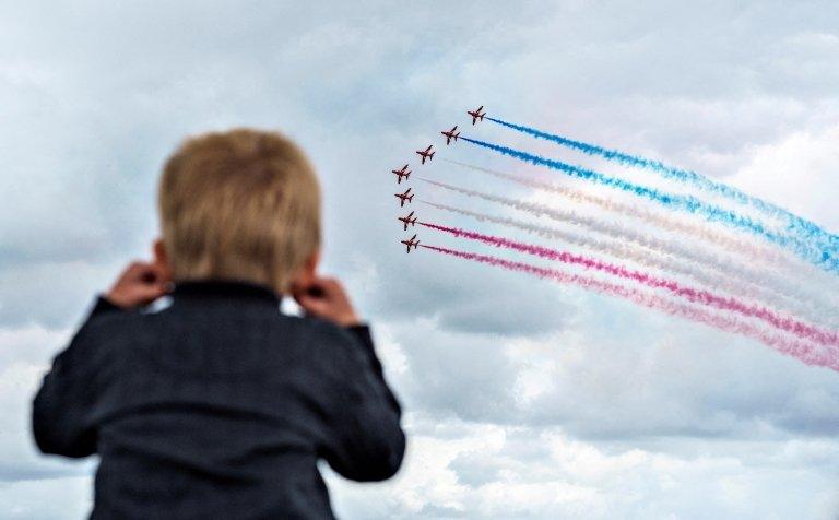 boy watching the red arrows