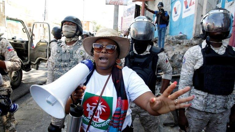 Demonstrators take part in a protest against Haiti's President Jovenel Moise, in Port-au-Prince, Haiti February 14, 2021.