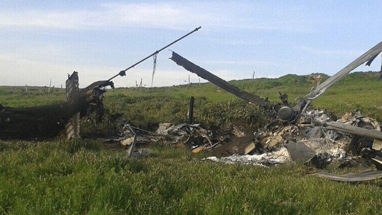 Mobile phone picture of downed helicopter