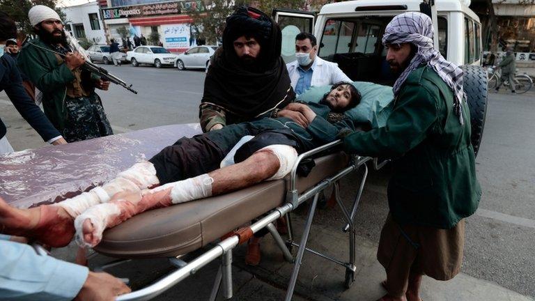 A Taliban fighter, injured during a blast, is pictured at the entrance of a hospital in Kabul, Afghanistan November 2, 2021.