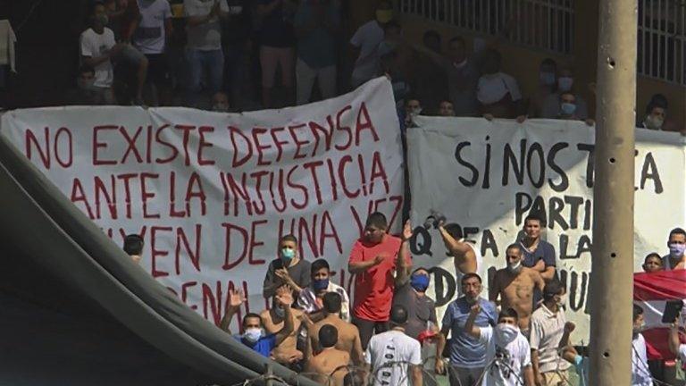 Video grab of inmates chanting in protest after a prison riot took place over fears of the new coronavirus at the Castro Castro prison in Lima on April 28, 2020