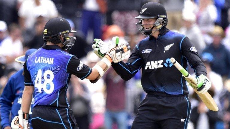 Martin Guptill and Tom Latham celebrate