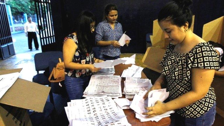 Poll workers count ballots at a polling station in Guayaquil, Ecuador February 19, 2017.