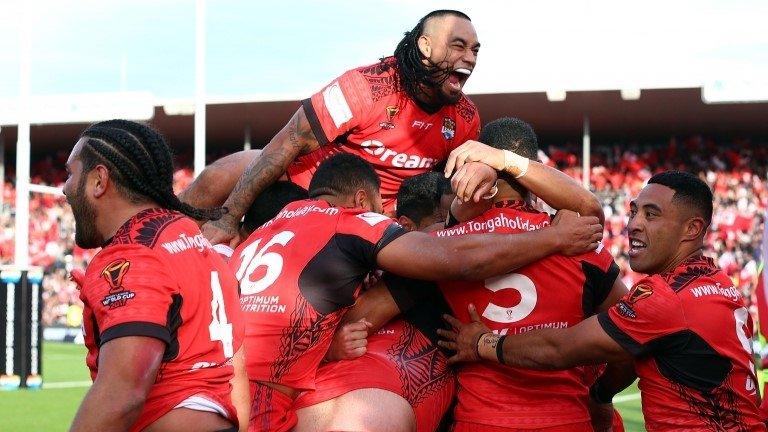 Tonga players celebrate