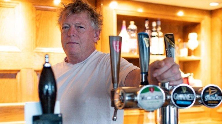 Landlord John Turner in his pub The Dolphin