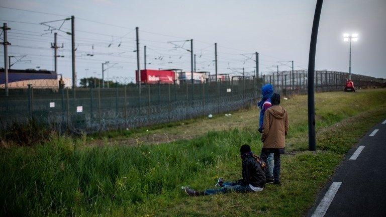 Calais migrants attempt to find a way to reach the UK