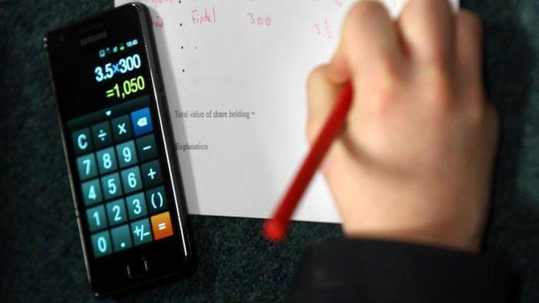 Pupil using phone as calculator