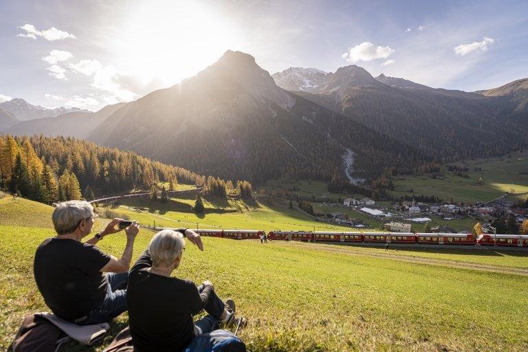 people watch train go by