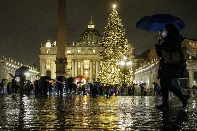 An illuminated Christmas tree donated by the Trentino region stands in Saint Peter's Square, Vatican City,