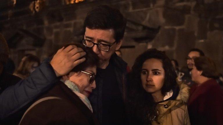 Relatives and colleagues of two journalists and a driver who were abducted on the border with Colombia, demonstrate during a vigil at the Independence square in Quito on March 27, 2018.