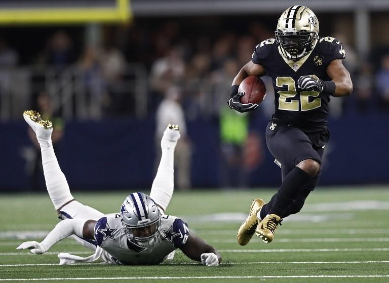 Action from American football match between the Dallas Cowboys and the New Orleans Saints