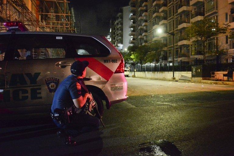 A Filipino policeman takes position outside the Resort World Manila hotel in Pasay city, south of Manila, Philippines, 02 June 2017.