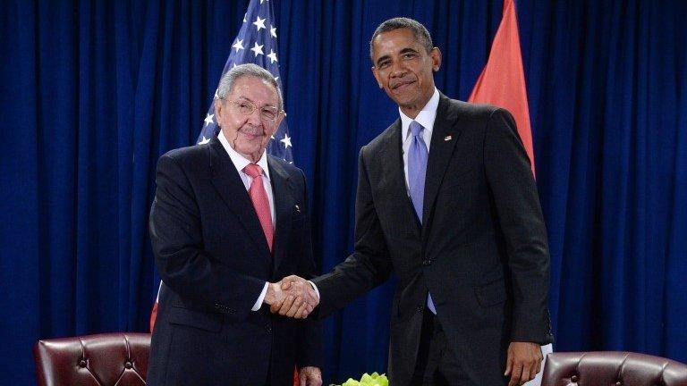 US President Barack Obama (right) and Cuban President Raul Castro (left) shake hands during a bilateral meeting at the United Nations Headquarters on 29 September, 2015 in New York City