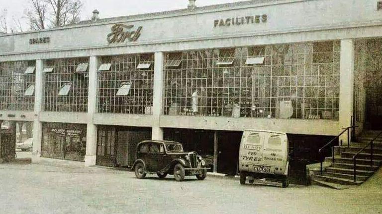 A vintage black Ford Anglia outside Hendy Ford's former dealership in Southampton.