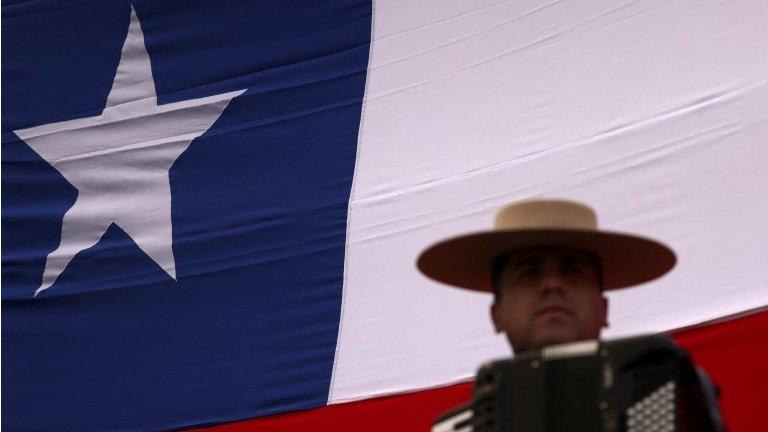 A demonstrator who is against the proposed new Chilean constitution, attends a rally so called "Long live the countryside" in defence of rural traditions according to organizers, ahead of the September 4th constitutional referendum, at Paine area, in Santiago, Chile August 26, 2022