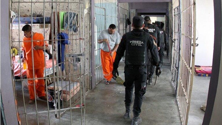 A handout picture provided by the Government of Monterrey shows police officers conducting a search in the Topo Chico Prison in Monterrey, Mexico on 14 February 2016