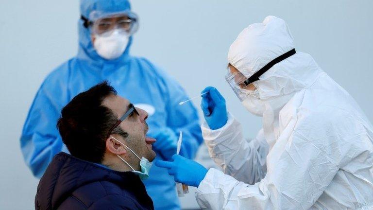 A man is tested for coronavirus in Rome