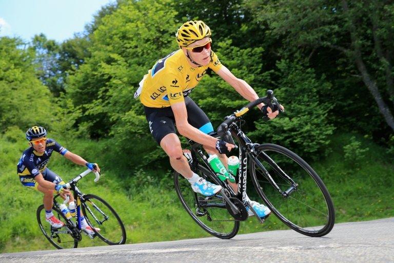 Chris Froome riding a Pinarello bike during a Tour de France stage