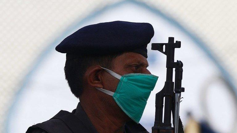 A police officer stands guard in Karachi, Pakistan (file photo)