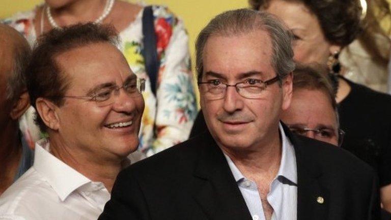 A file picture dated 12 March 2016 shows the former lower house Speaker Chamber Eduardo Cunha (right) and Senate Speaker Renan Calheiros (left) in Brasilia