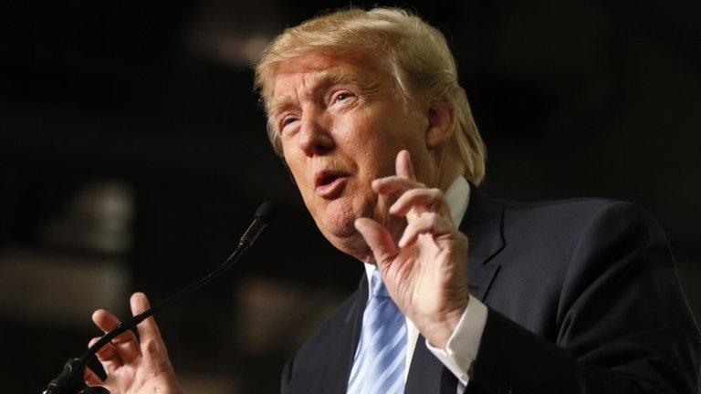 In this Monday, Nov. 23, 2015, file photo, Republican presidential candidate, businessman Donald Trump speaks during a rally at the Greater Columbus Convention Center in Columbus, Ohio.