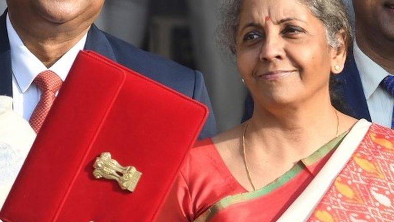 Indian Finance Minister Nirmala Sitharaman holds a folder containing Union Budget documents outside the Ministry of Finance in New Delhi, India, 01 February 2021.