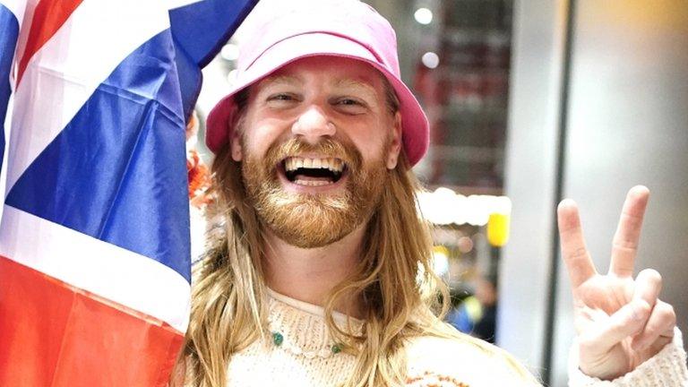 Sam Ryder arrives at Heathrow Airport in London after finishing second in the final of the Eurovision Song Contest in Italy