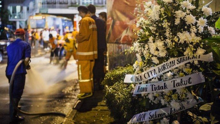 A floral tribute left in front of the site of the attacks in Jakarta