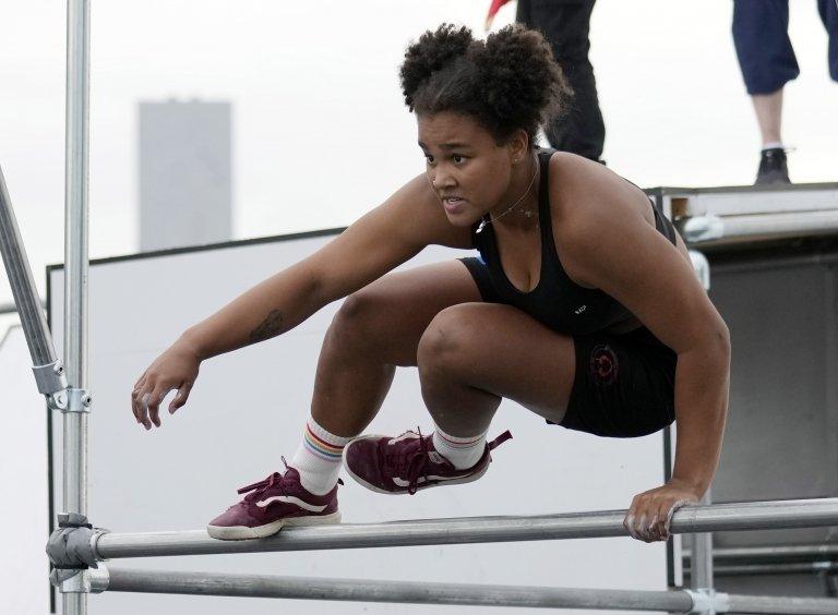 Miranda Tibbling hurdling a bar