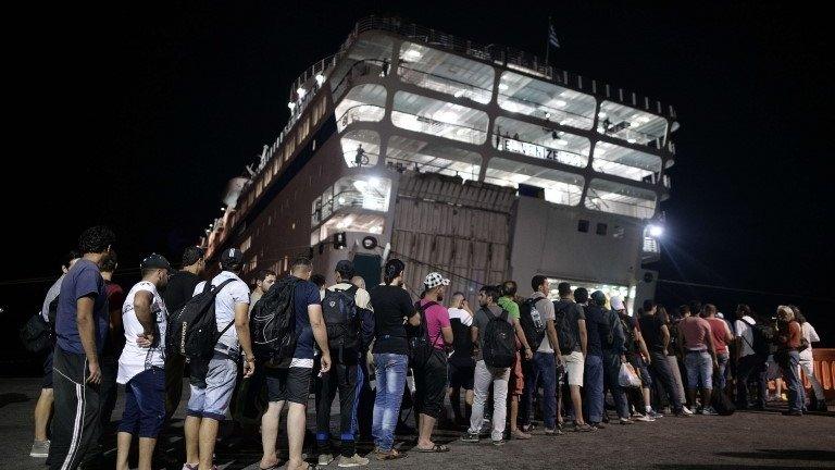 First group of Syrian migrants waits to board the ship - 16 August