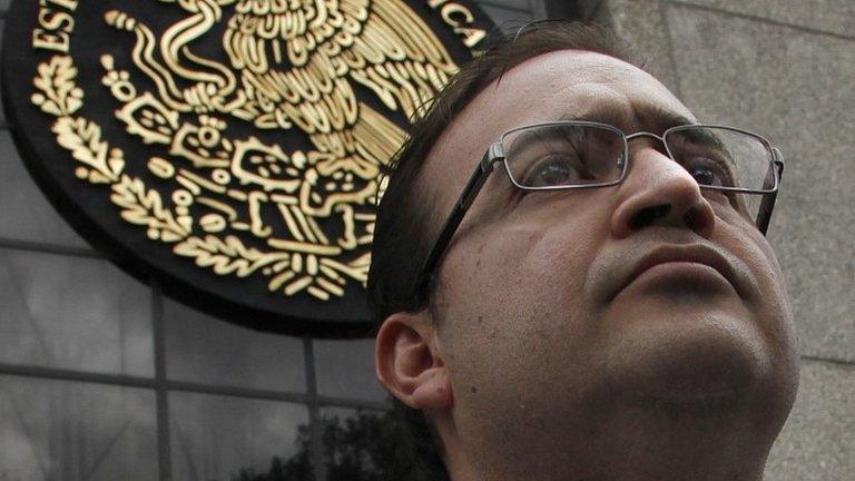 In this Aug. 5, 2016, file photo, Veracruz Gov. Javier Duarte stands outside the Attorney General"s headquarters in Mexico City