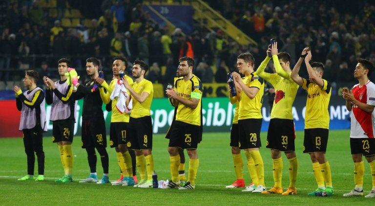 Dortmund applaud the fans after their defeat