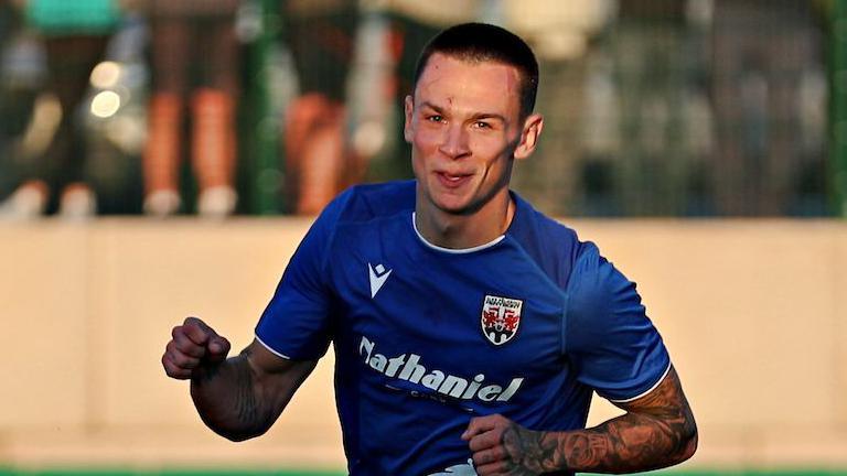 Ryan Hill celebrates after scoring for Penybont