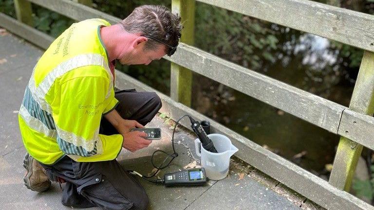 Environment Agency officers at the pollution incident